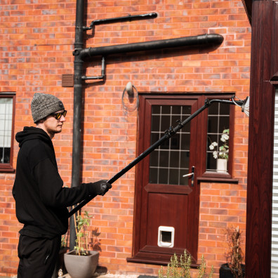 Pole fed water window cleaner